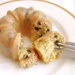 a miniature Bailey's bundt cake on a plate with a fork