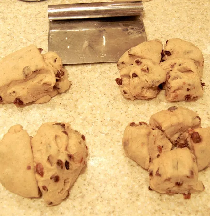dough portioned and ready to form into hot cross buns
