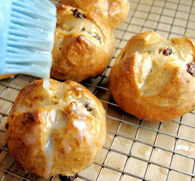 hot cross buns brushed with sugar glaze