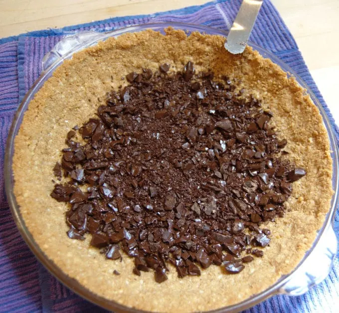 Chopped chocolate on a graham cracker crust. 