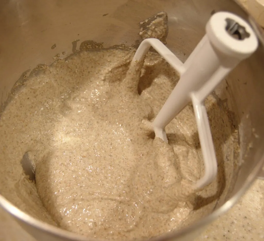 a mixing bowl filled with rye bread sponge
