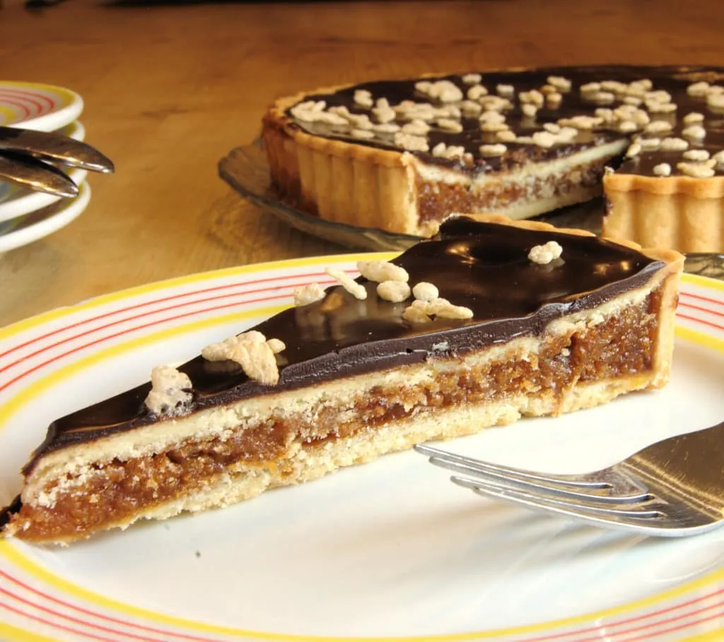 a slice of Chocolate Caramel Crackle Tart