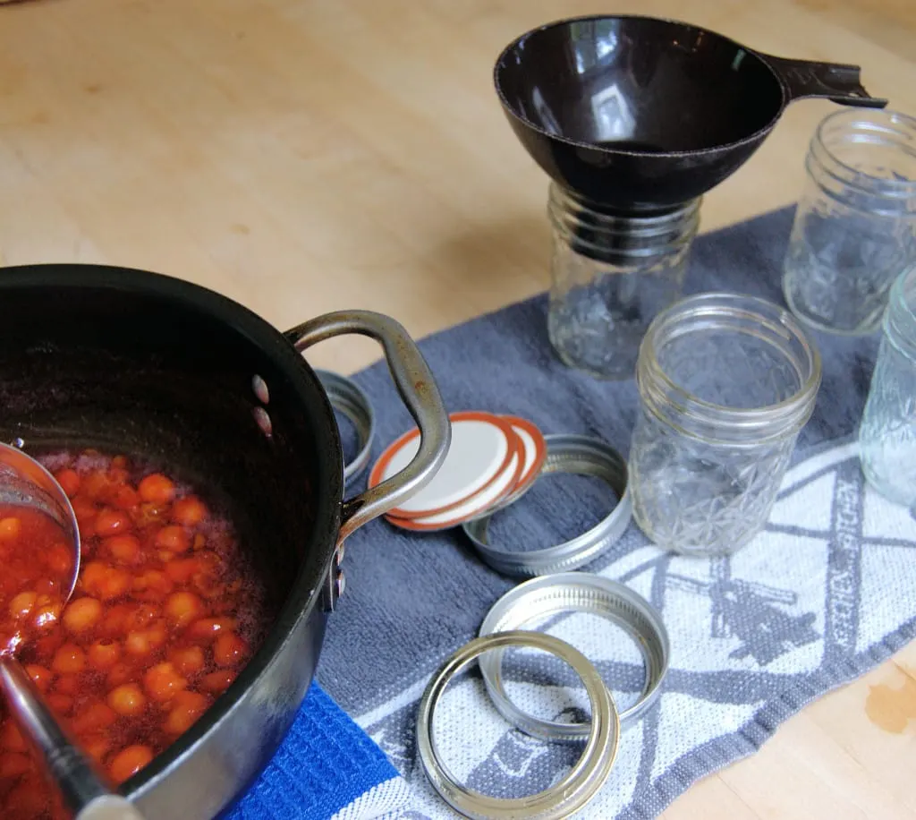 Sterilized jars and lids ready for filling.