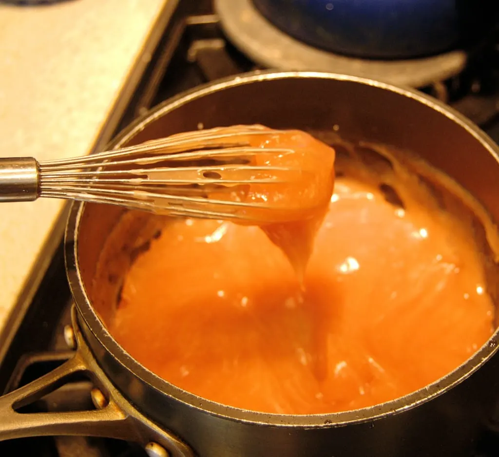 Cherry juice thickened with cornstarch in a saucepan