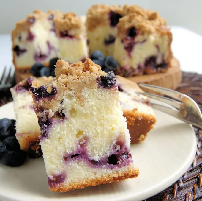 a slice of blueberry buttermilk coffee cake