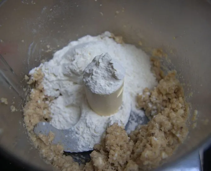 ground walnuts with butter and flour in a food processor