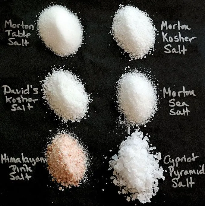 A photo showing the size and shape of various types of salt 