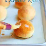a pinterest image for buttermilk dinner rolls with text overlay.