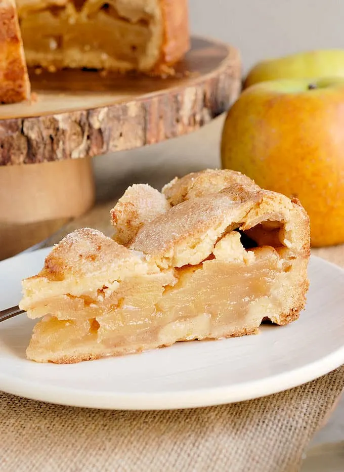 a slice of juicy dutch apple tart