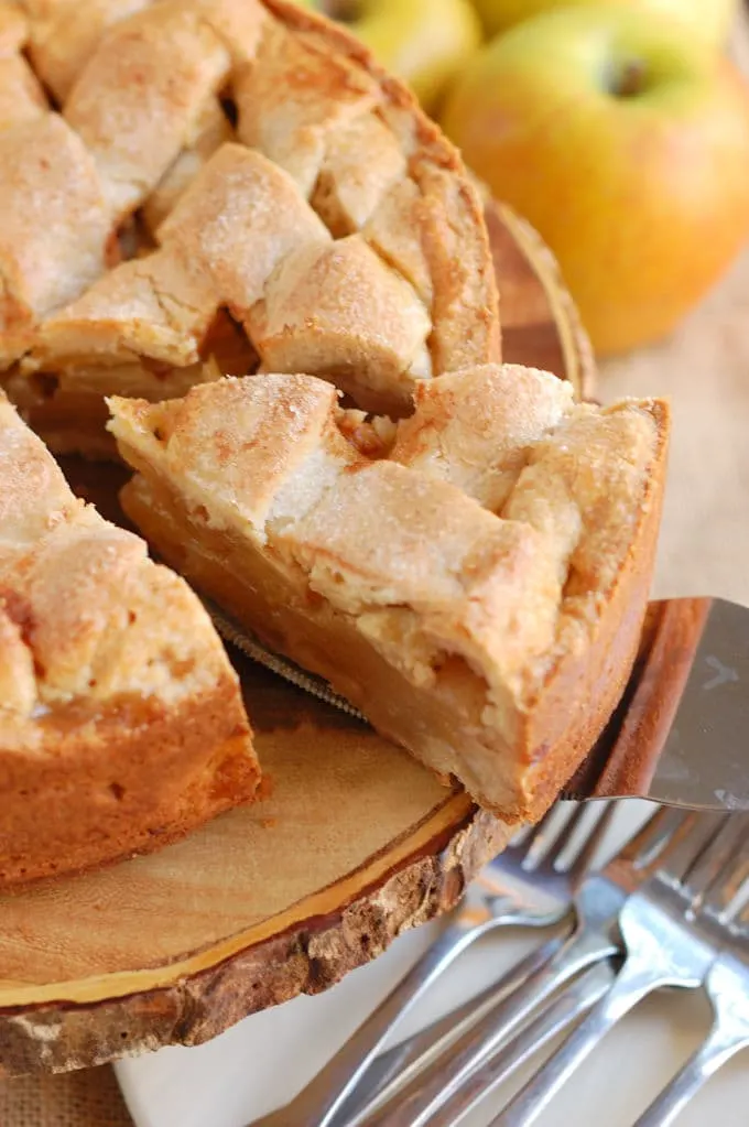 an overhead shot of a Dutch Apple Tart being sliced