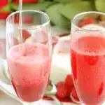 two glasses of raspberry rose bellini