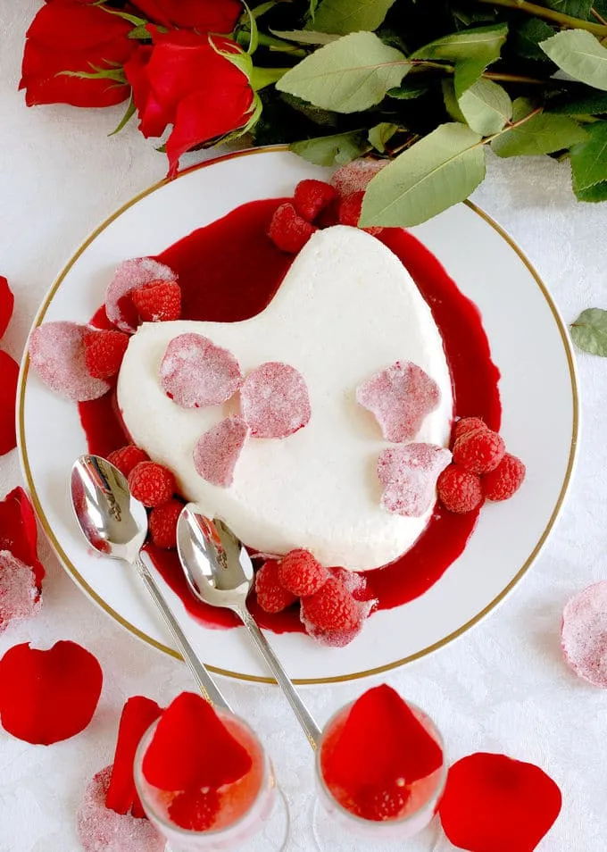 coeur la creme with raspberry rose sauce and candied rose petals