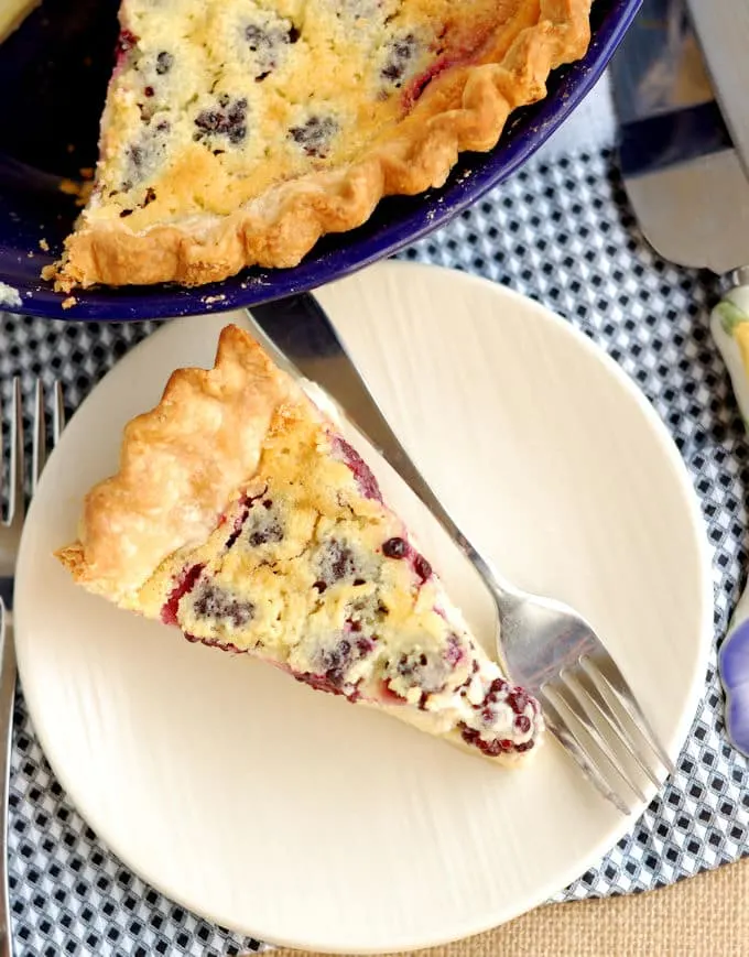 a slice of blackberry buttermilk pie