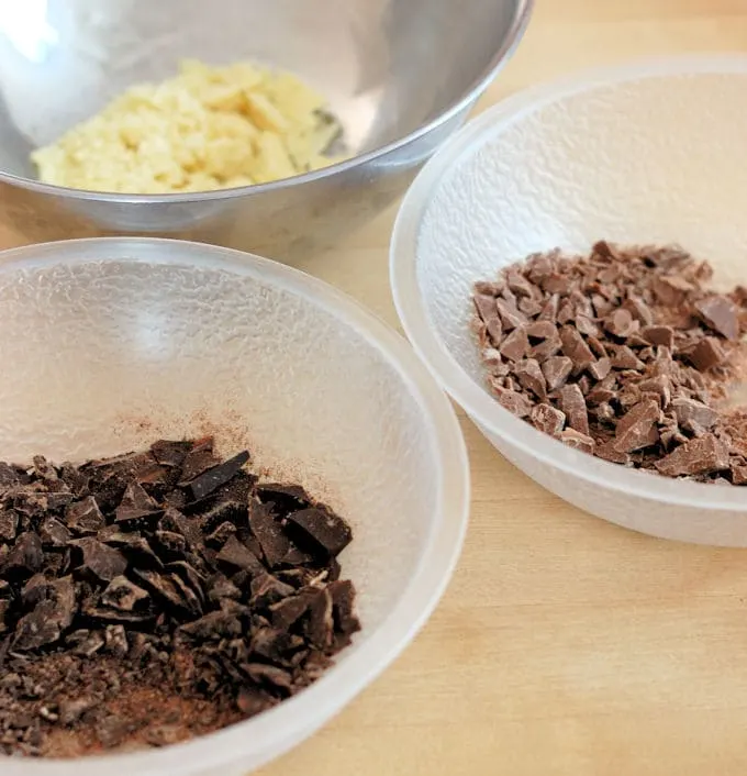 three bowls of chocolate, dark milk and white