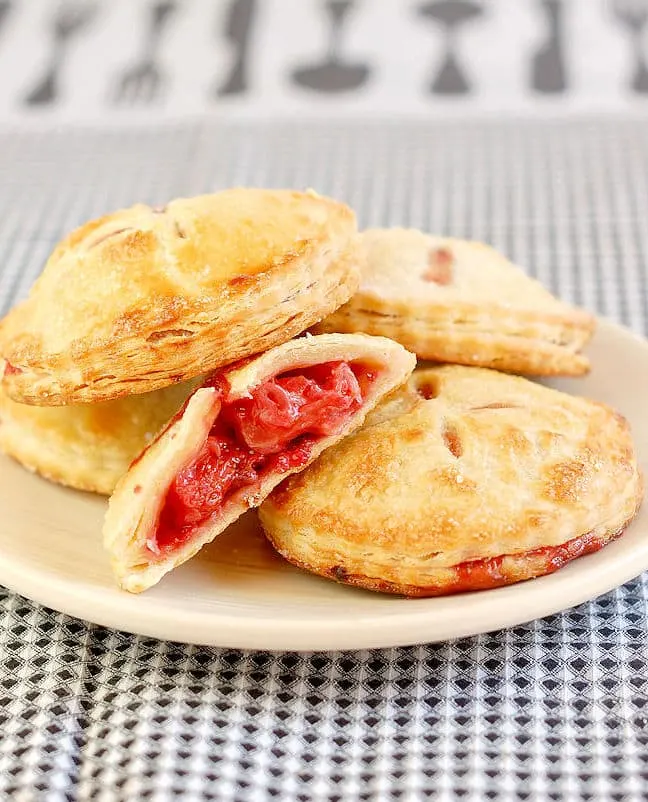 strawberry hand pies on a plate