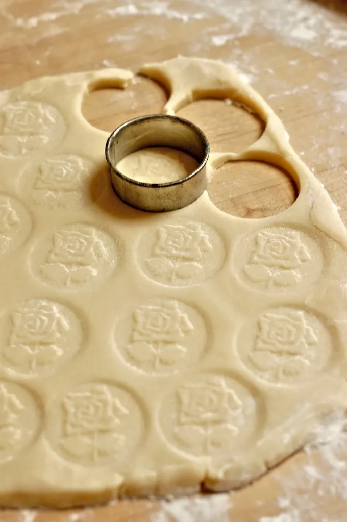 cutting rounds of rosewater cookies