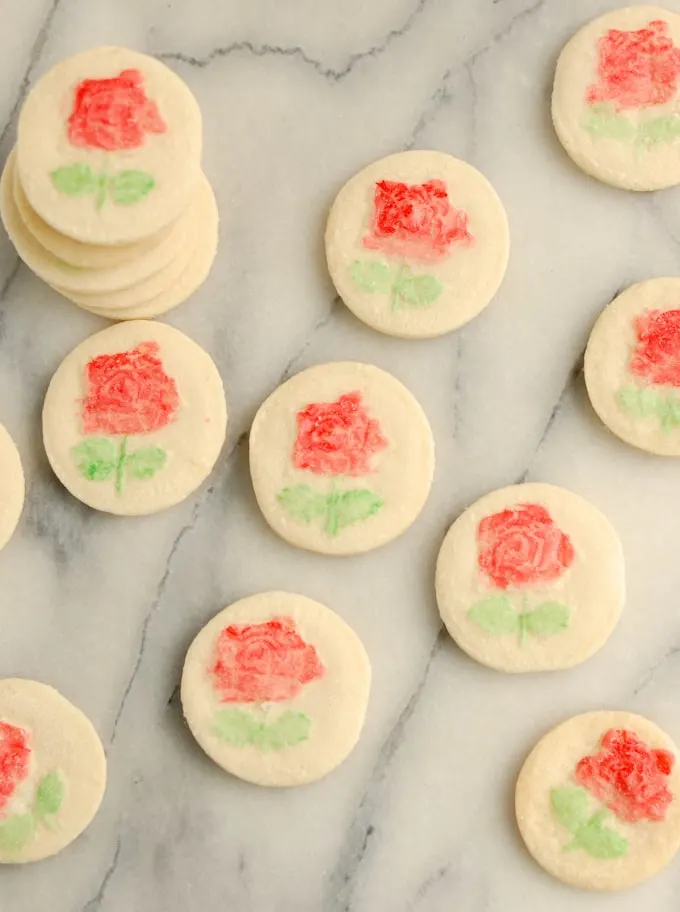rosewater cookies on a marble surface.