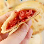 a strawberry hand pie image for pinterest with text overlay