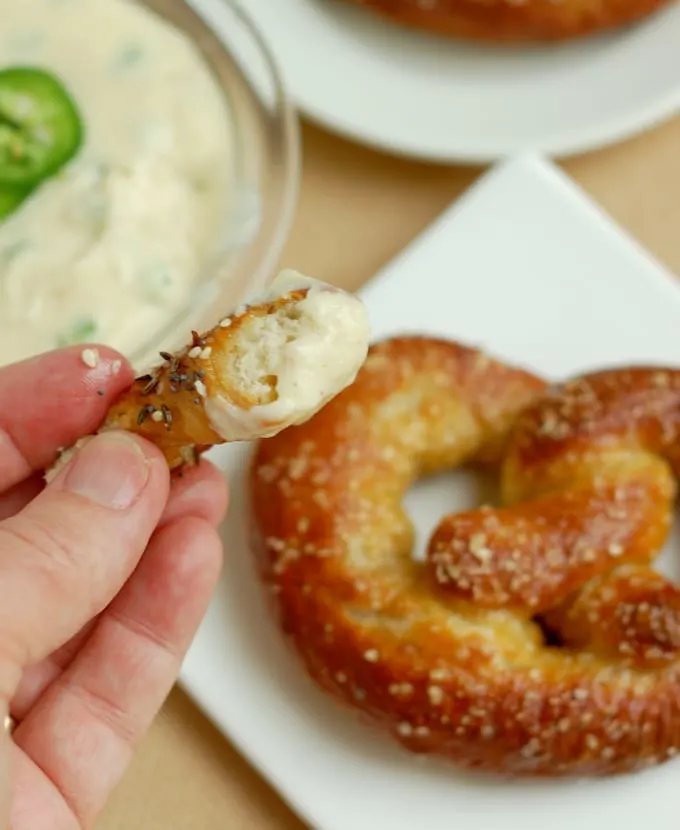 beer infused bavarian pretzel dipped in cheese sauce
