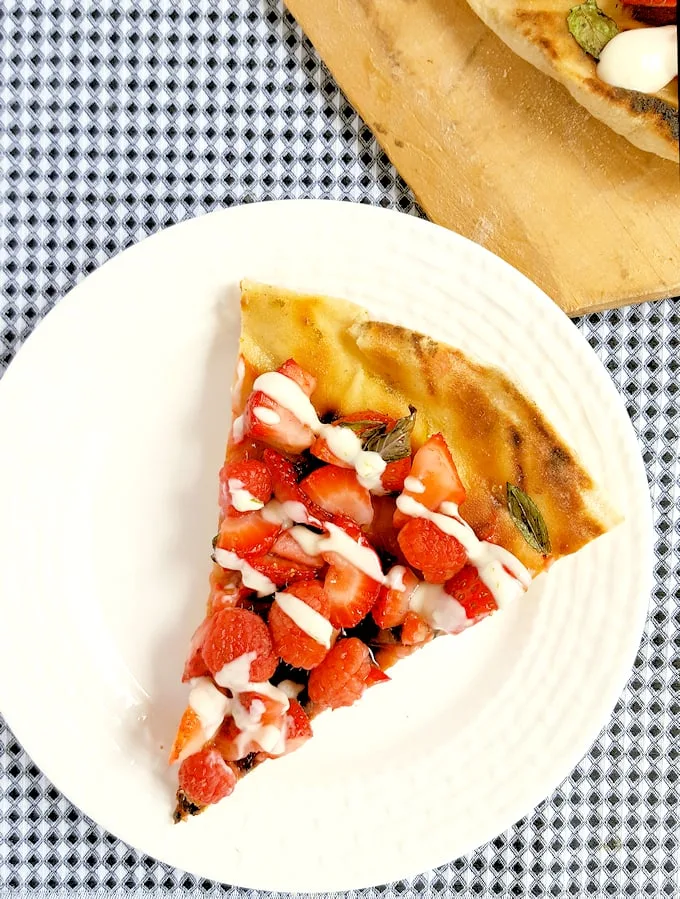 a slice of dessert pizza on a white plate