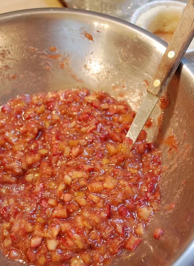 a bowl of roasted rhubarb filling for summer pudding