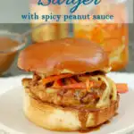 a pinterest image for chicken satay burger