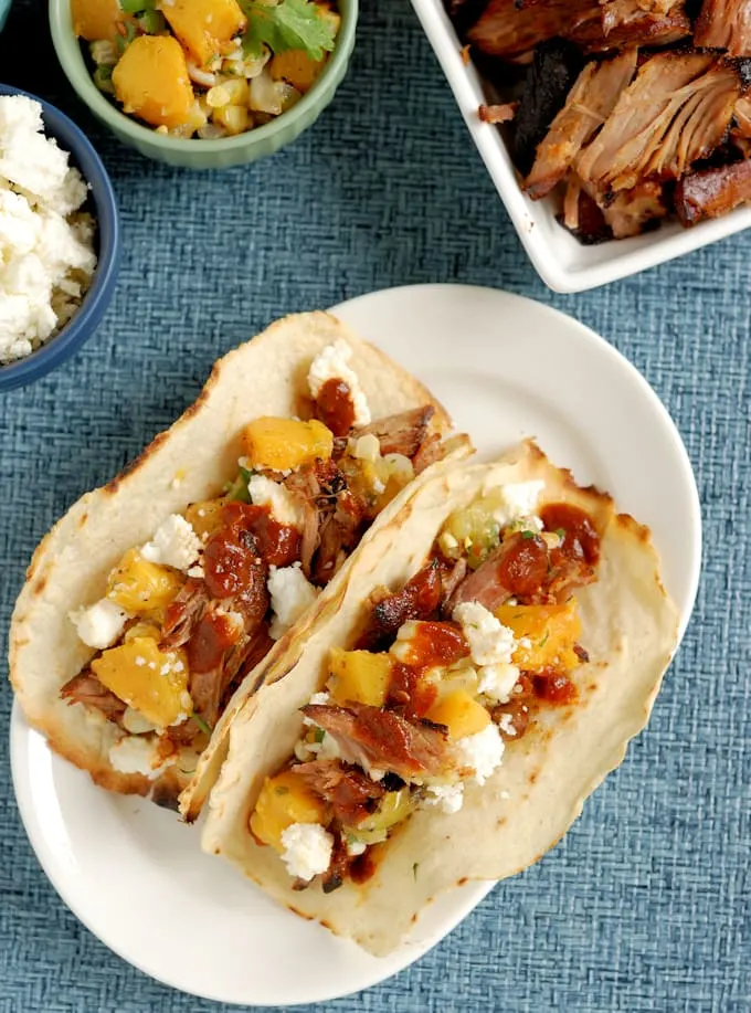 pulled pork tacos on a plate