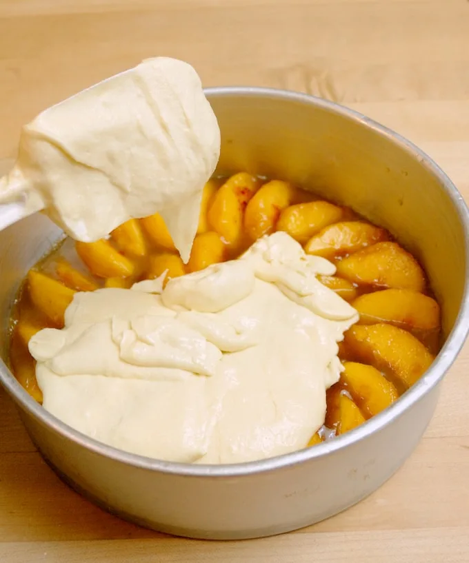 a peach upside down cake ready for the oven