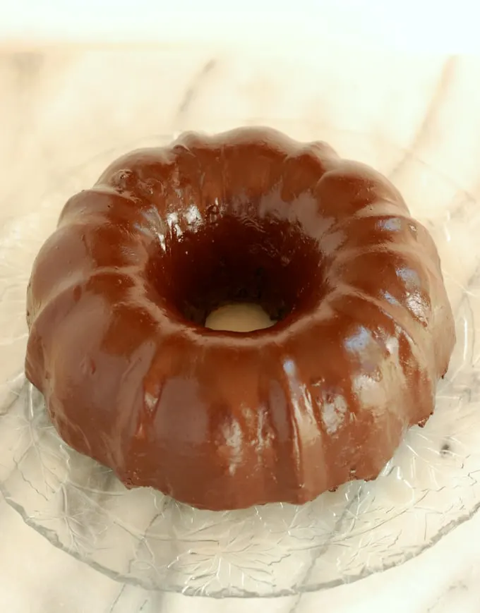 a chocolate beet cake on a glass plate