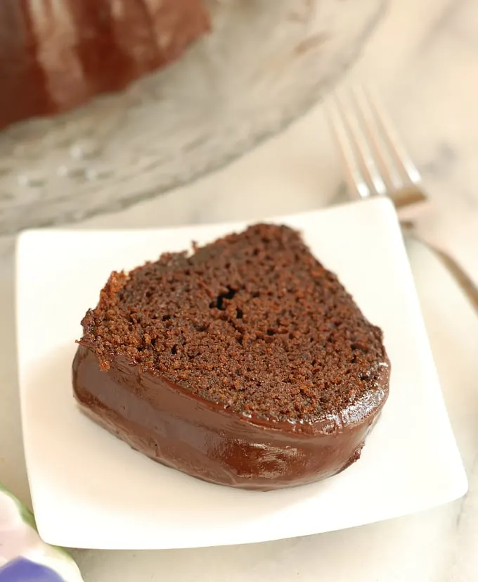 a slice of chocolate beet cake on a white plate