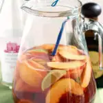 a pinterest image of a pitcher of sangria with text overlay