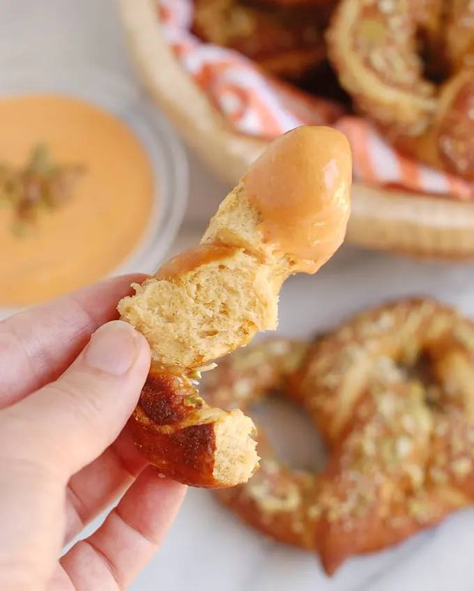 pumpkin-spice-ale-pretzels dipped in cheese sauce
