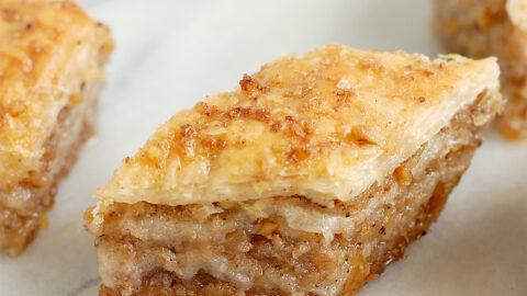 a piece of baklava on a marble surface.