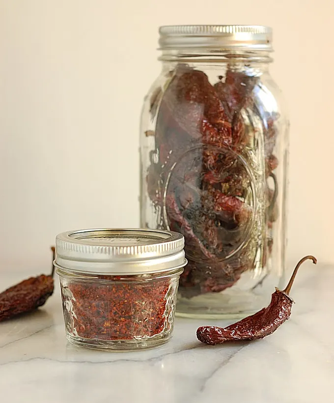 dried chipotle peppers in a jar and chipotle powder 