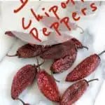 a pinterest image for how to make chipotle peppers with text overlay