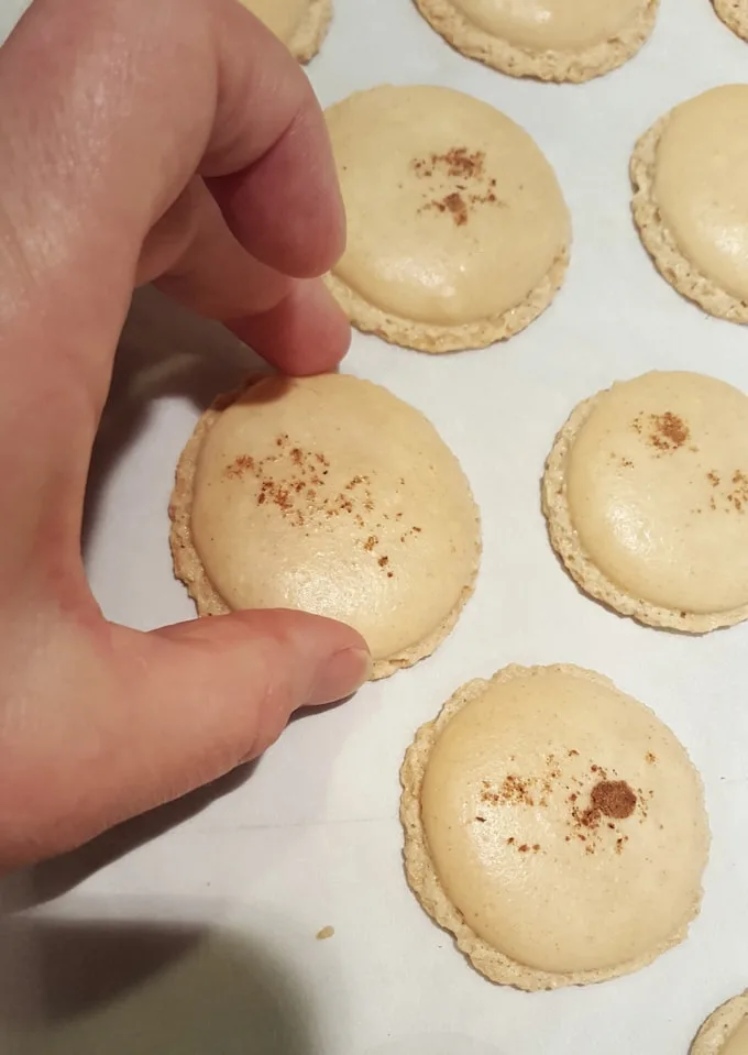 testing french macarons for doneness