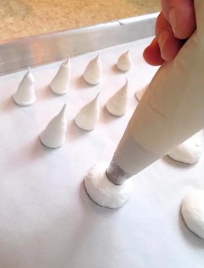 piping meringue mushroom caps