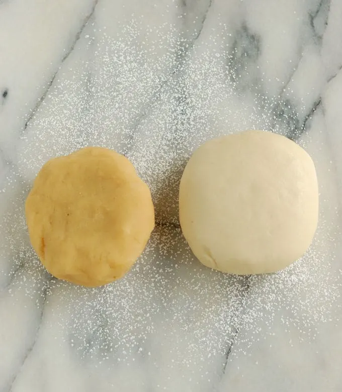 a piece of almond paste and a piece of homemade marzipan