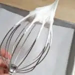 whipped egg whites on a whisk
