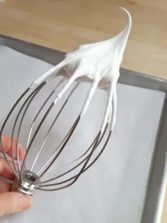 whipped egg whites on a whisk