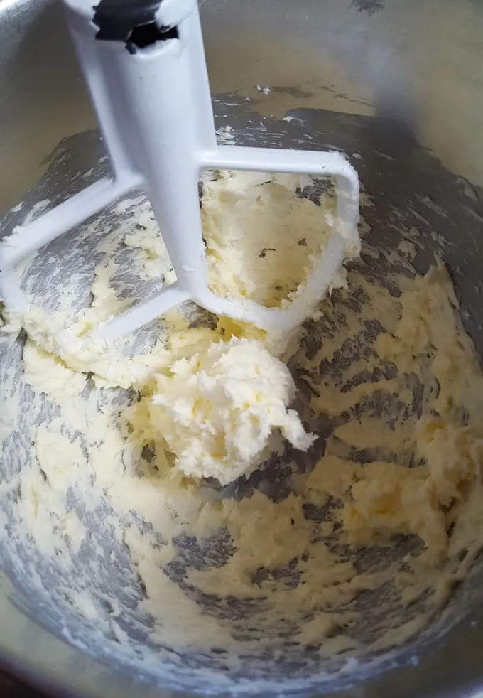 a mixing bowl with whipped butter