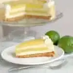 a slice of lime layered cheesecake