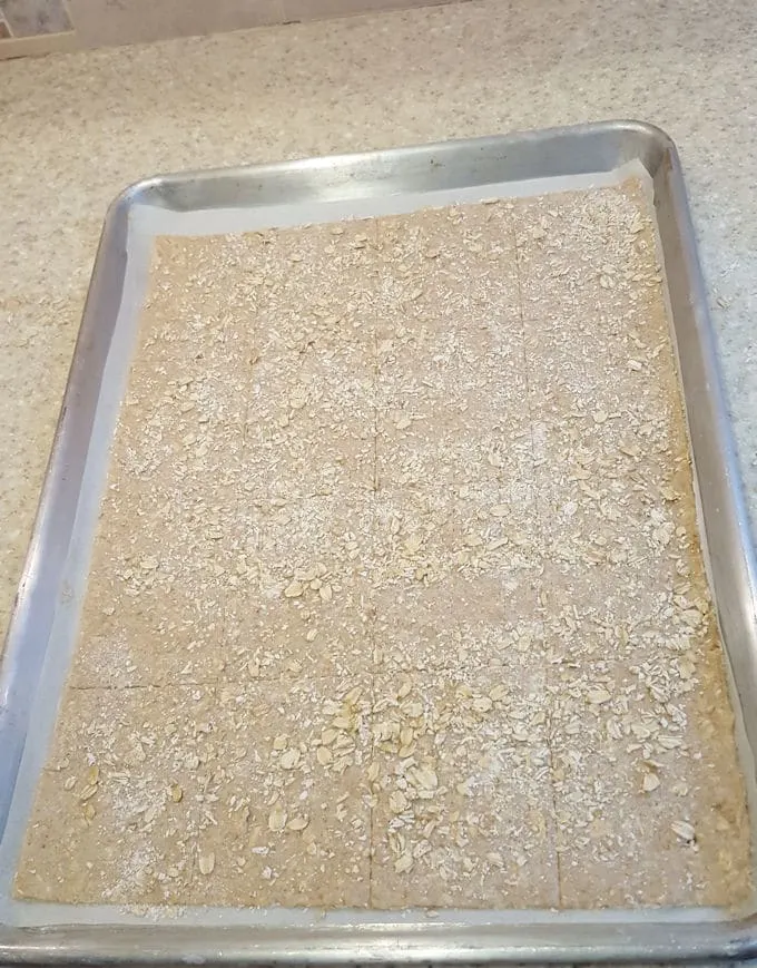 a tray of oatmeal crispbread ready for the oven