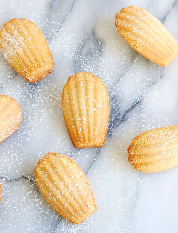 brown butter almond madeleines on a marble table