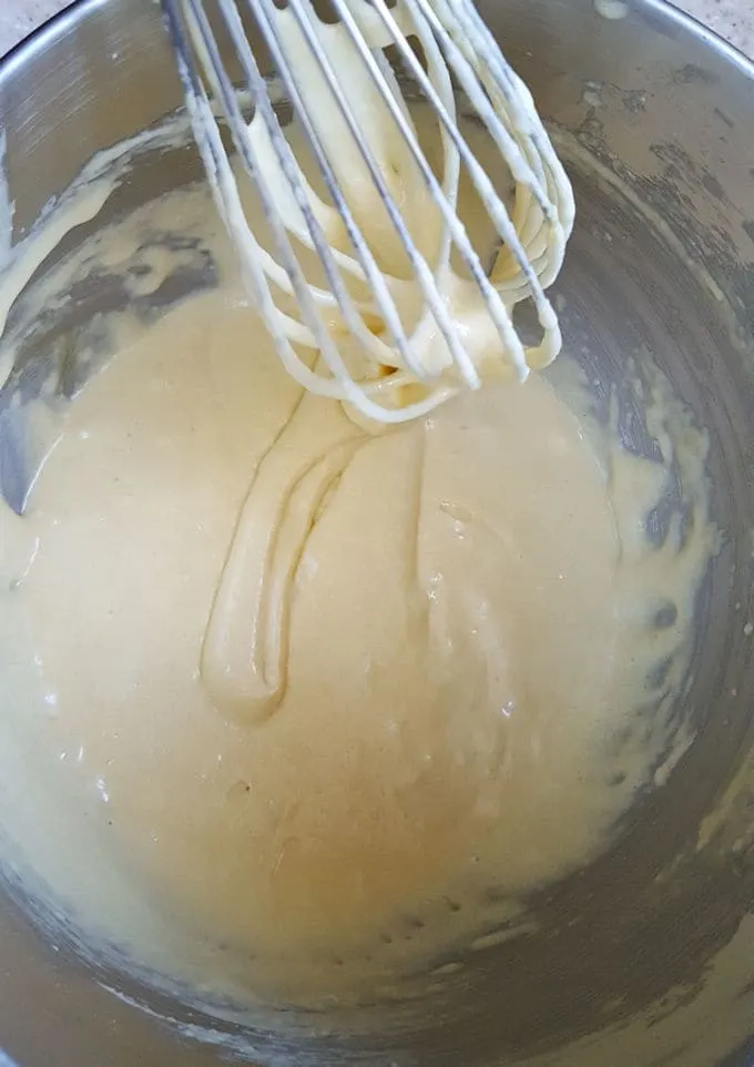 madeleine batter in a bowl