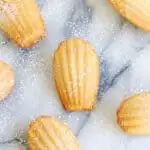 a pinterest image for brown butter madeleines