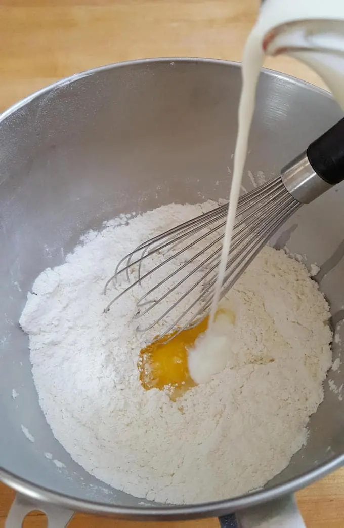 flour, butter and milk in a bowl
