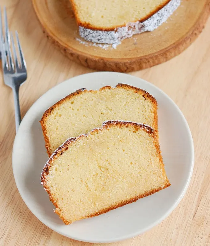 two slices of Honey pound cake on a plate