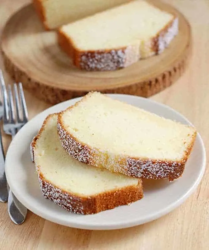 two slices of pound cake on a plate.