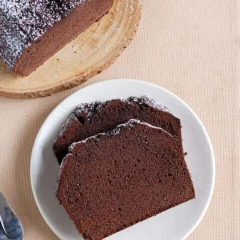 two slices of chocolate pound cake on a plate